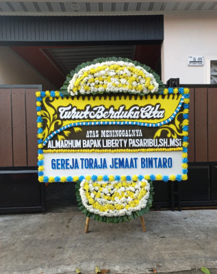 Papan Bunga Duka di Batangan